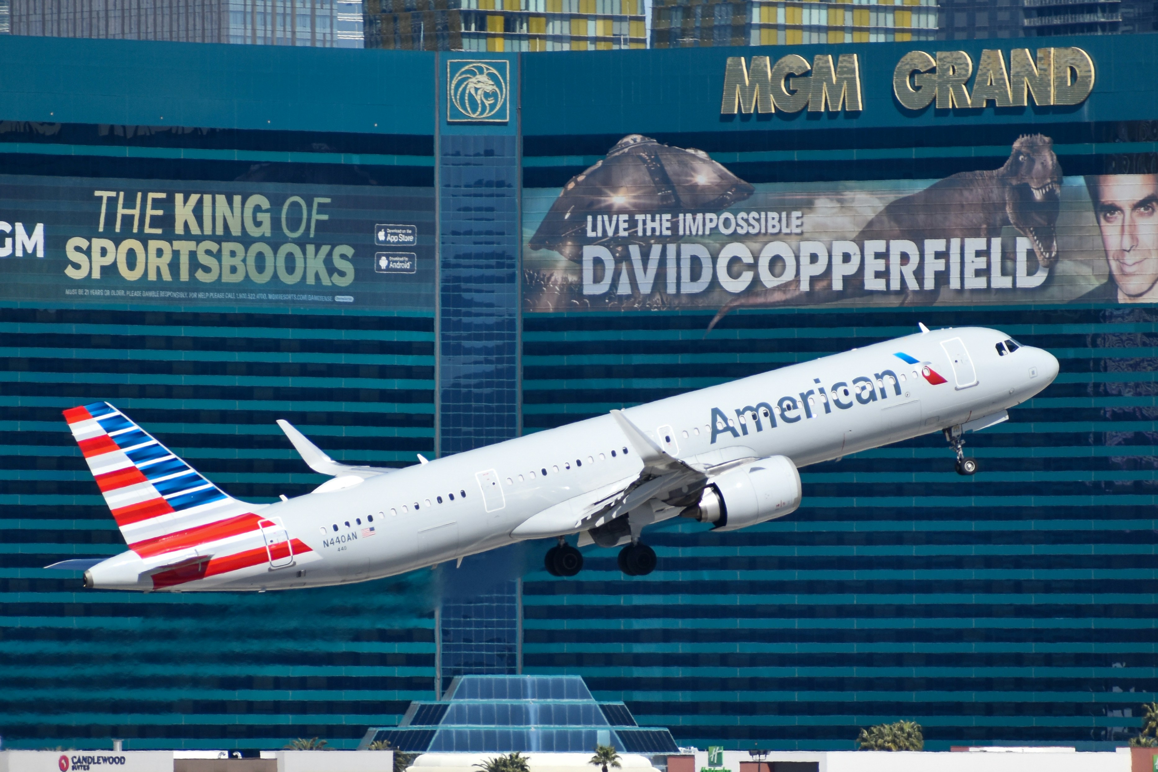 A large commercial airplane taking off from the las vegas strip