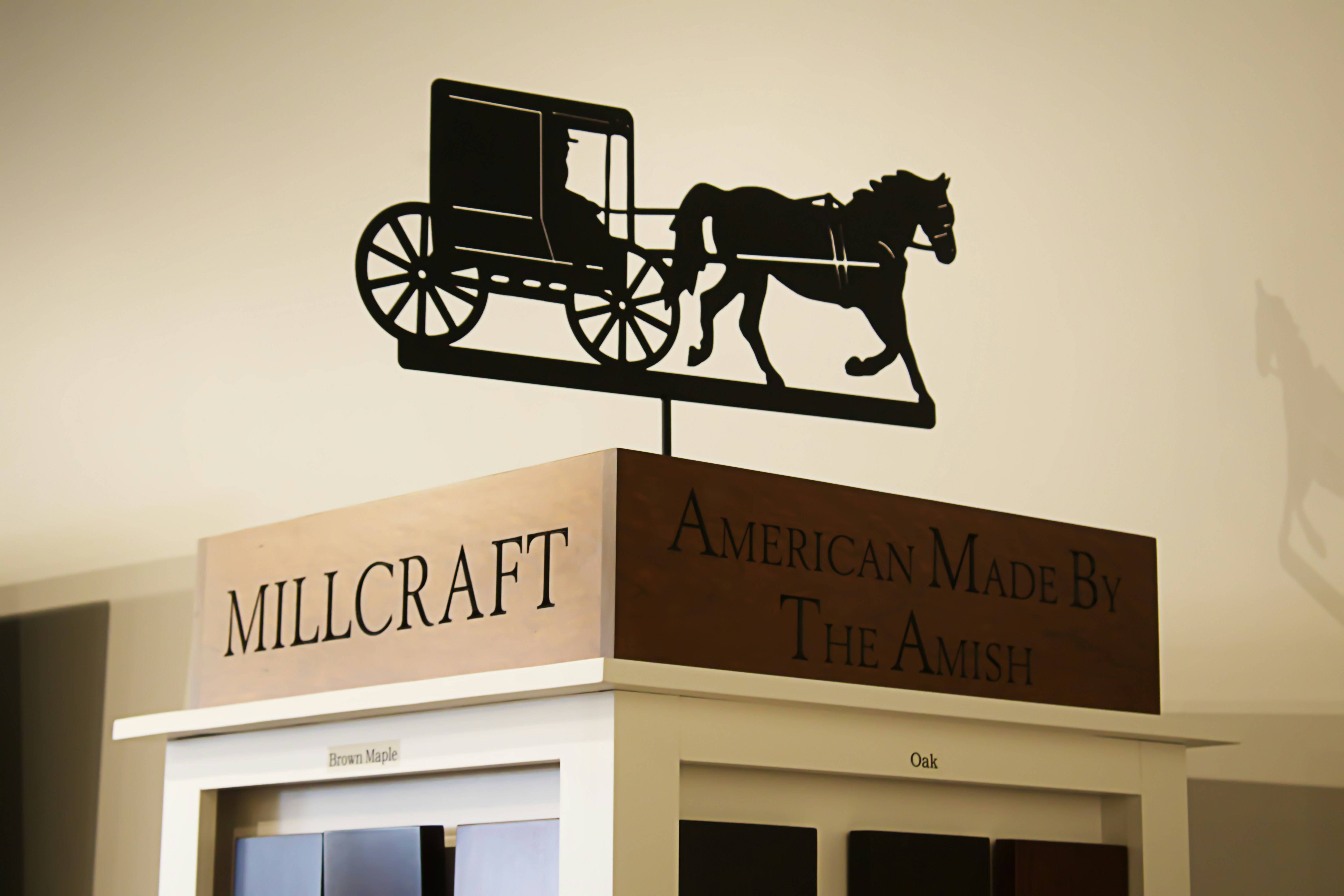 A horse drawn carriage on top of a building