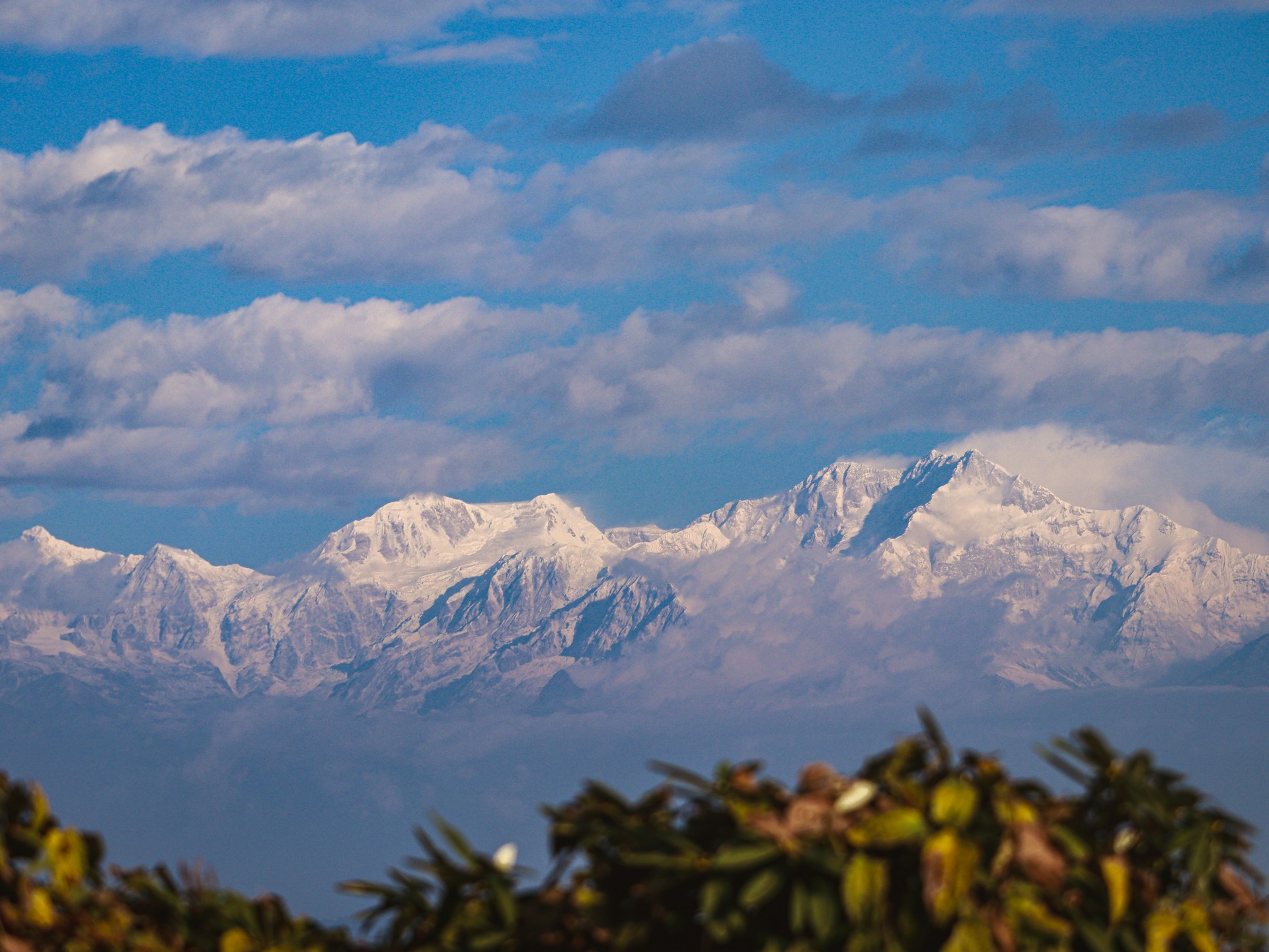 A snow covered mountain range in the distance
