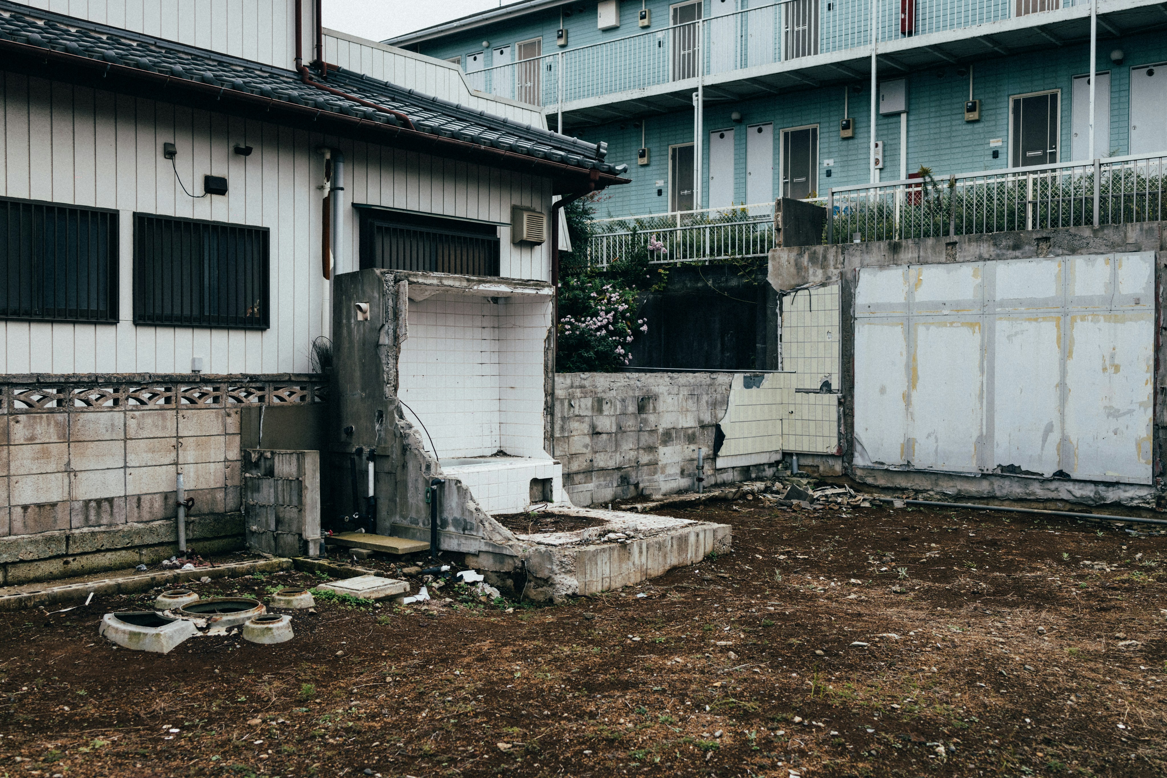 A run down house with a broken door