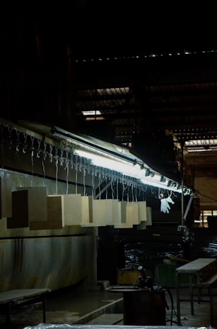 A factory with a lot of machines and boxes