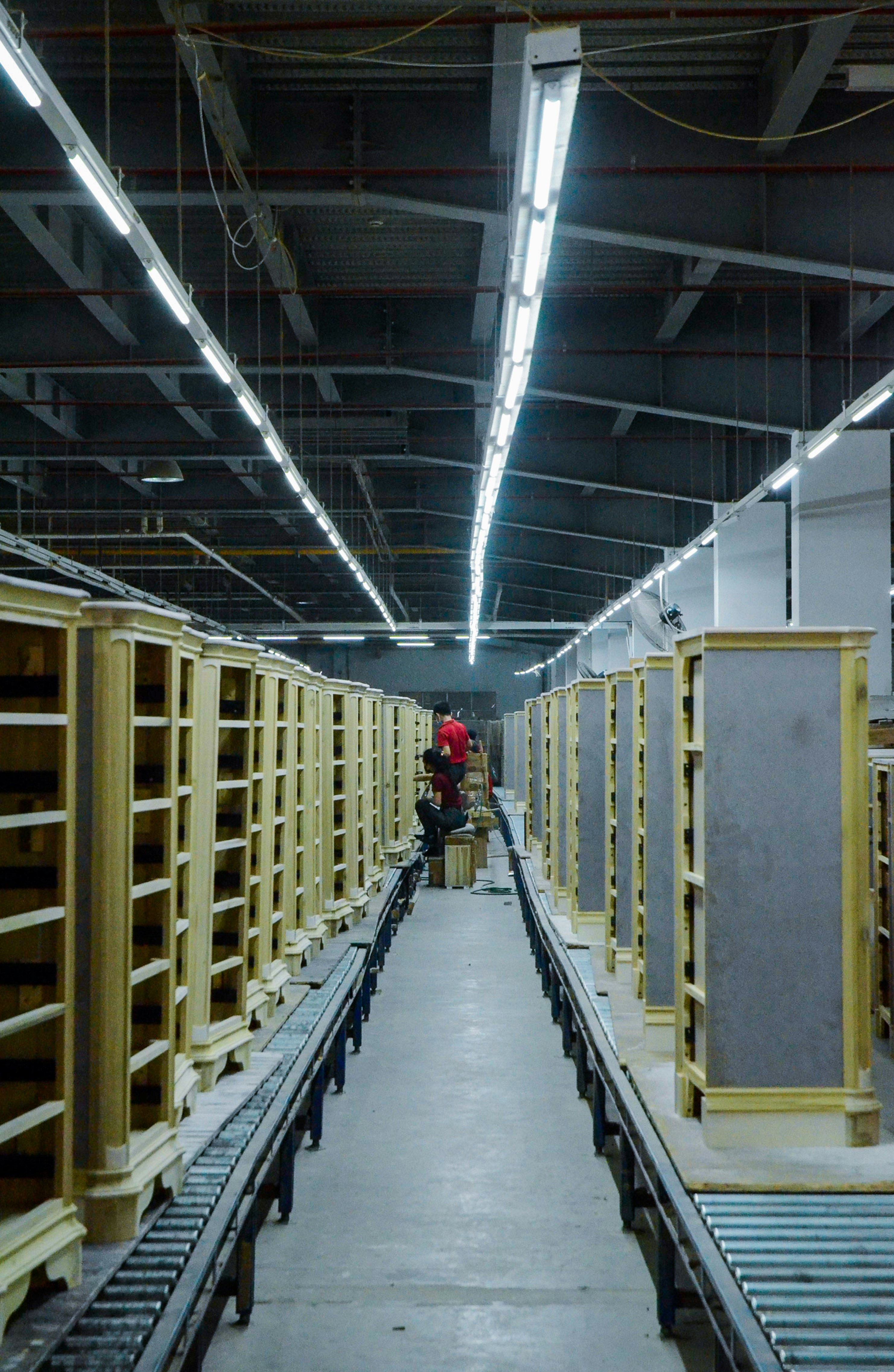 A long row of shelves in a warehouse