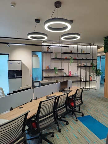 A conference room with a long table and chairs