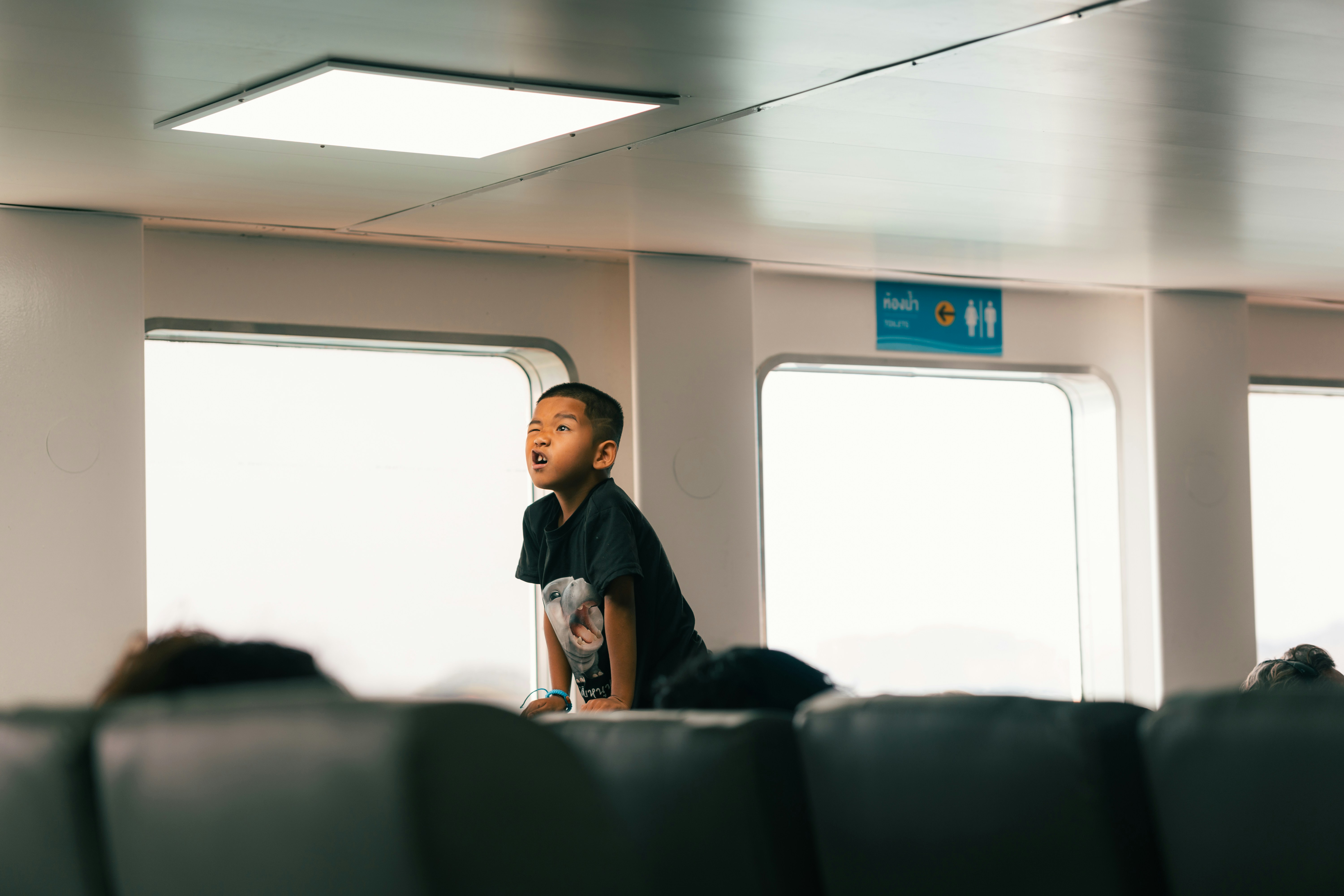 Boy copying face from T-shirt