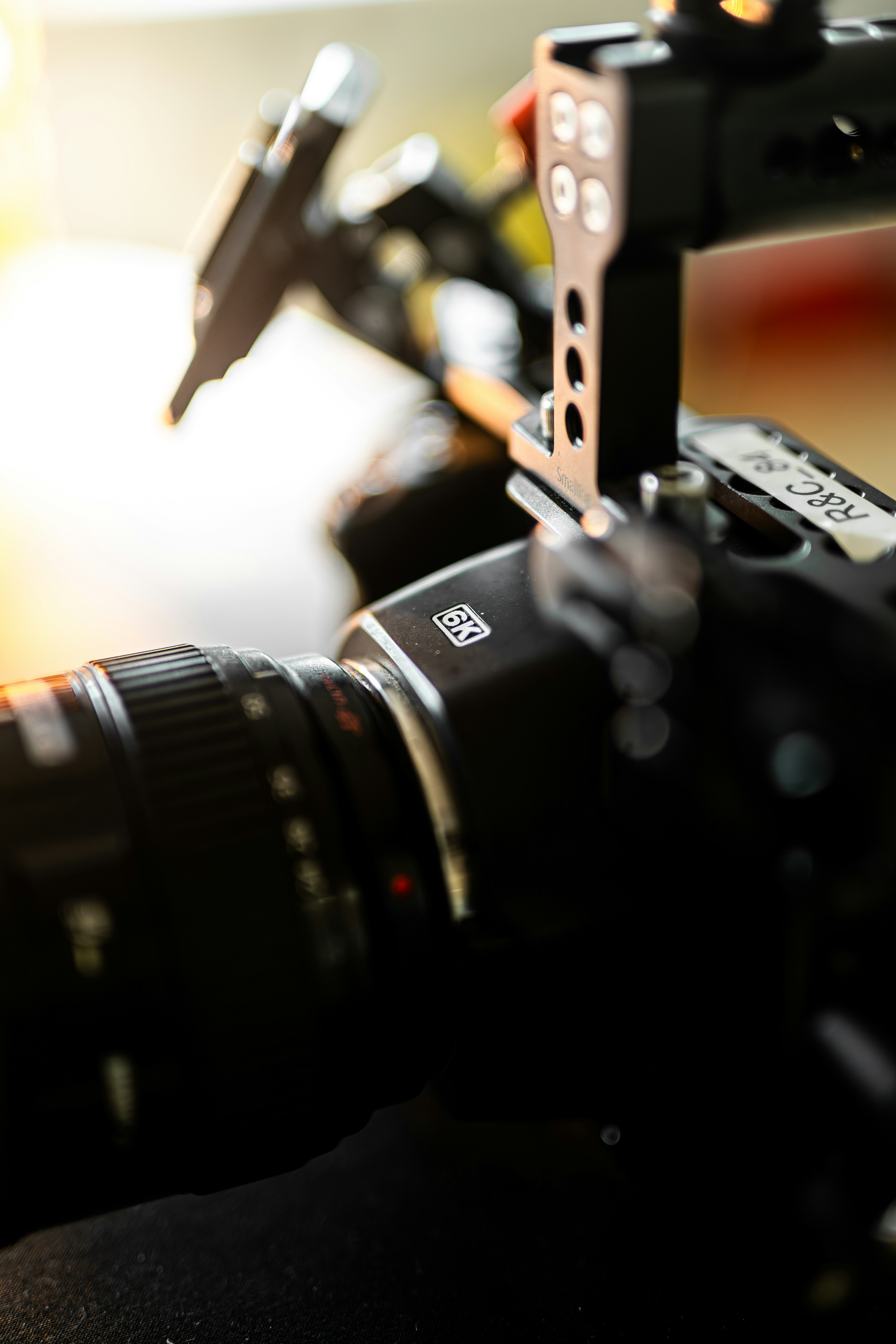 A close up of a camera with a lens attached to it
