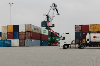 A large truck with a crane on top of it