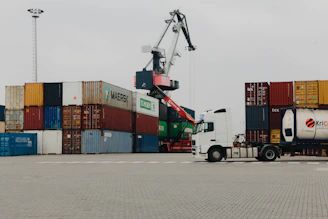 A large truck with a crane on top of it