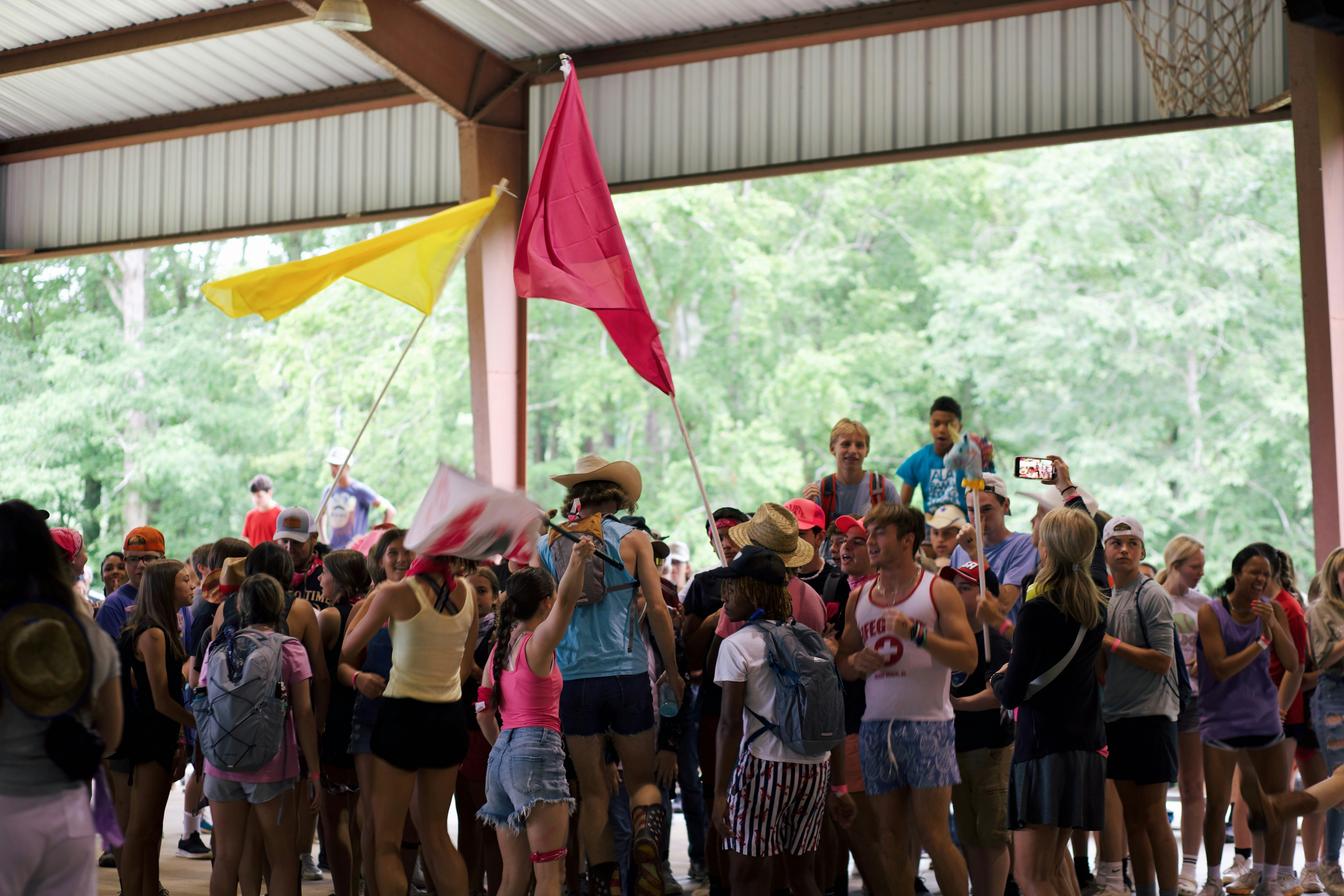 Camp teams raising team flags, getting ready for competition