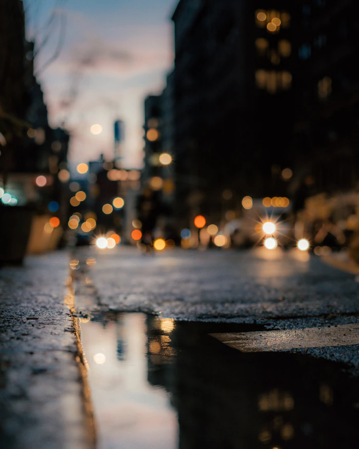 A flooded street with a puddle of water in NoHo, Manhattan, New York