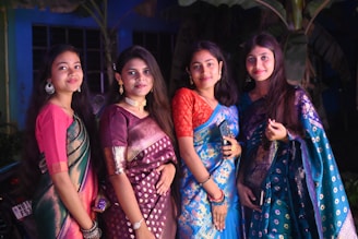 A group of women standing next to each other