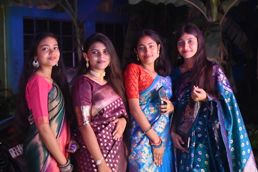 A group of women standing next to each other