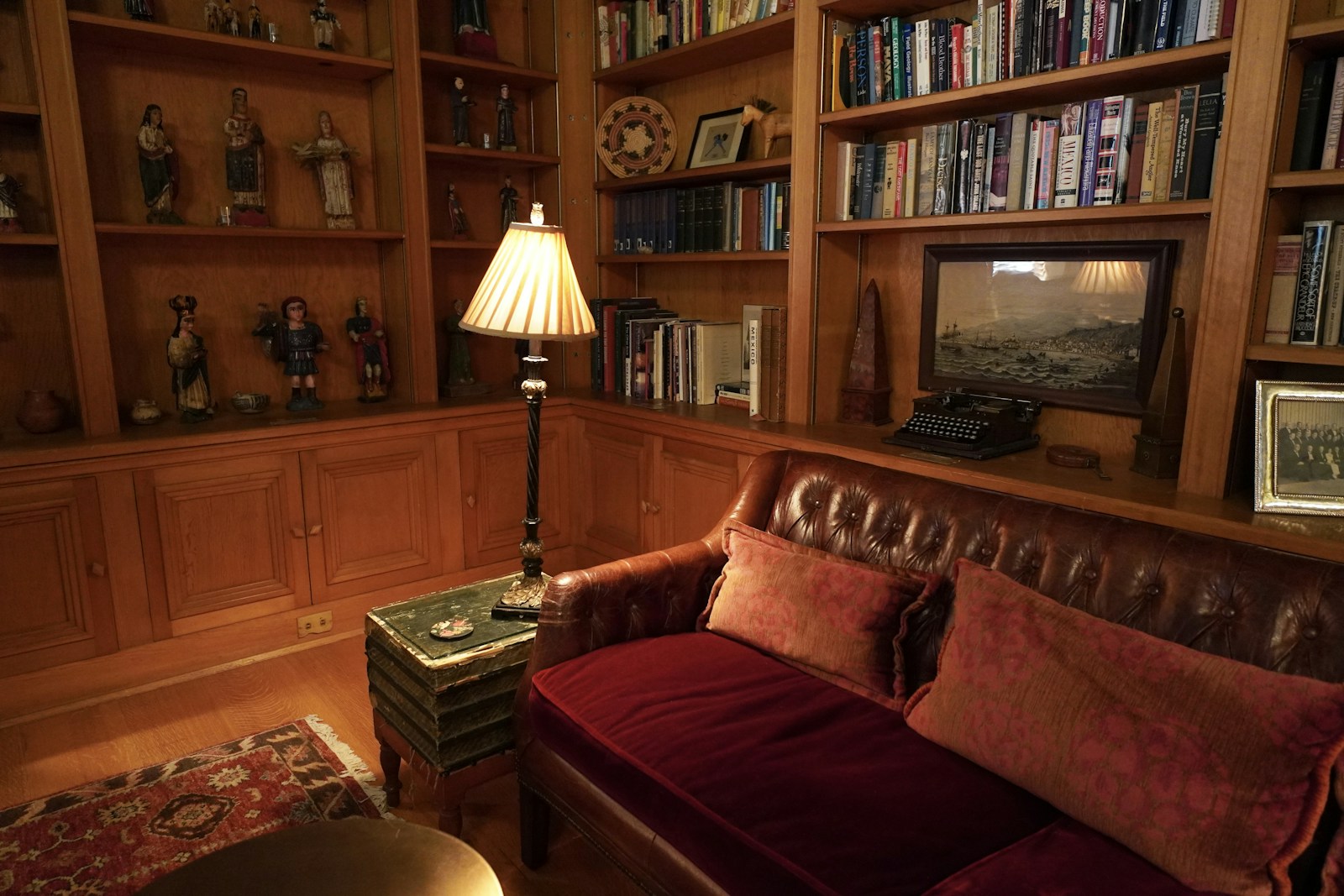A library of leather, wood and warm light