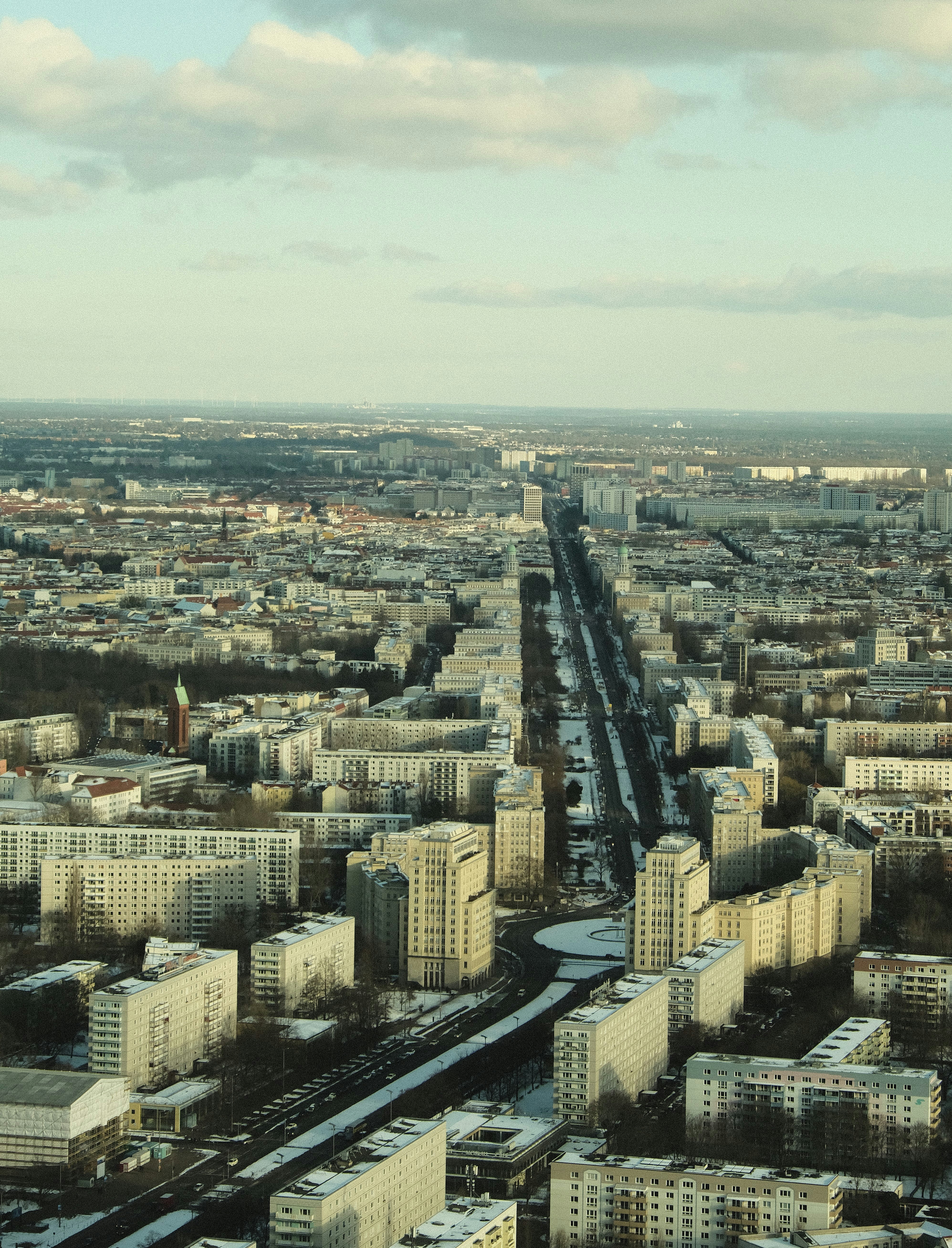An aerial view of a city with tall buildings