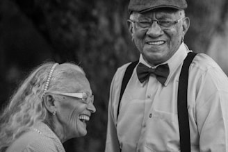 A black and white photo of a man and a woman