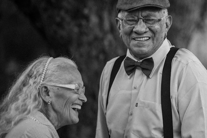 A black and white photo of a man and a woman