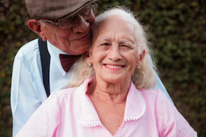 A man and a woman standing next to each other