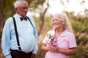 A man and a woman standing next to each other