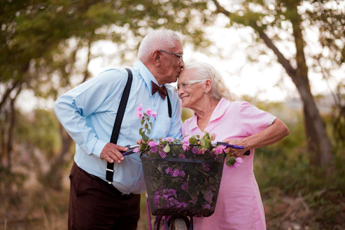 A man and a woman standing next to each other