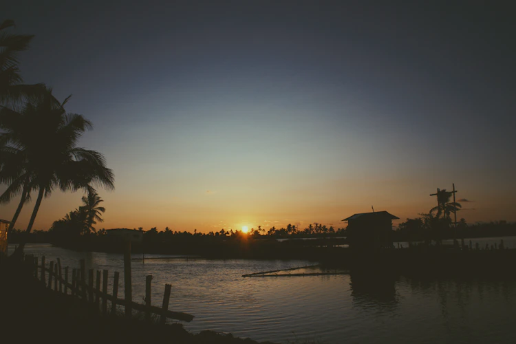 Sunrise over calm water