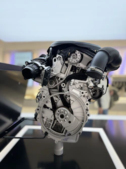 A close up of a motorcycle engine on a table