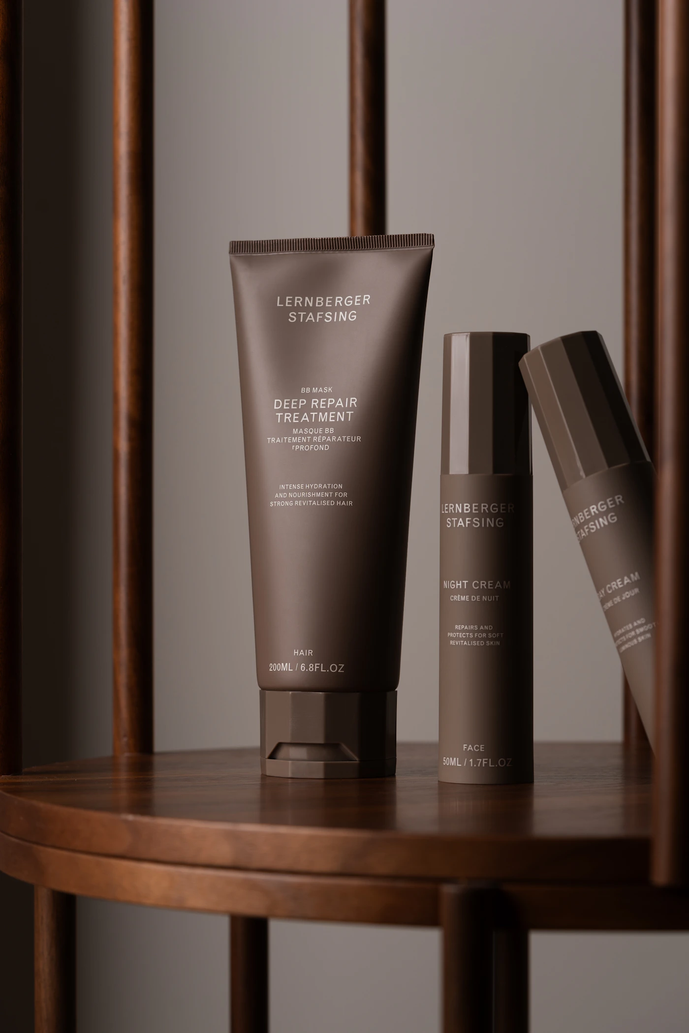 Minimal luxury skincare products displayed on shelves