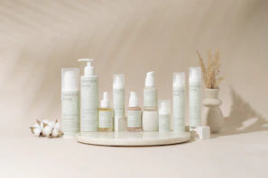A group of bottles of lotion sitting on top of a table