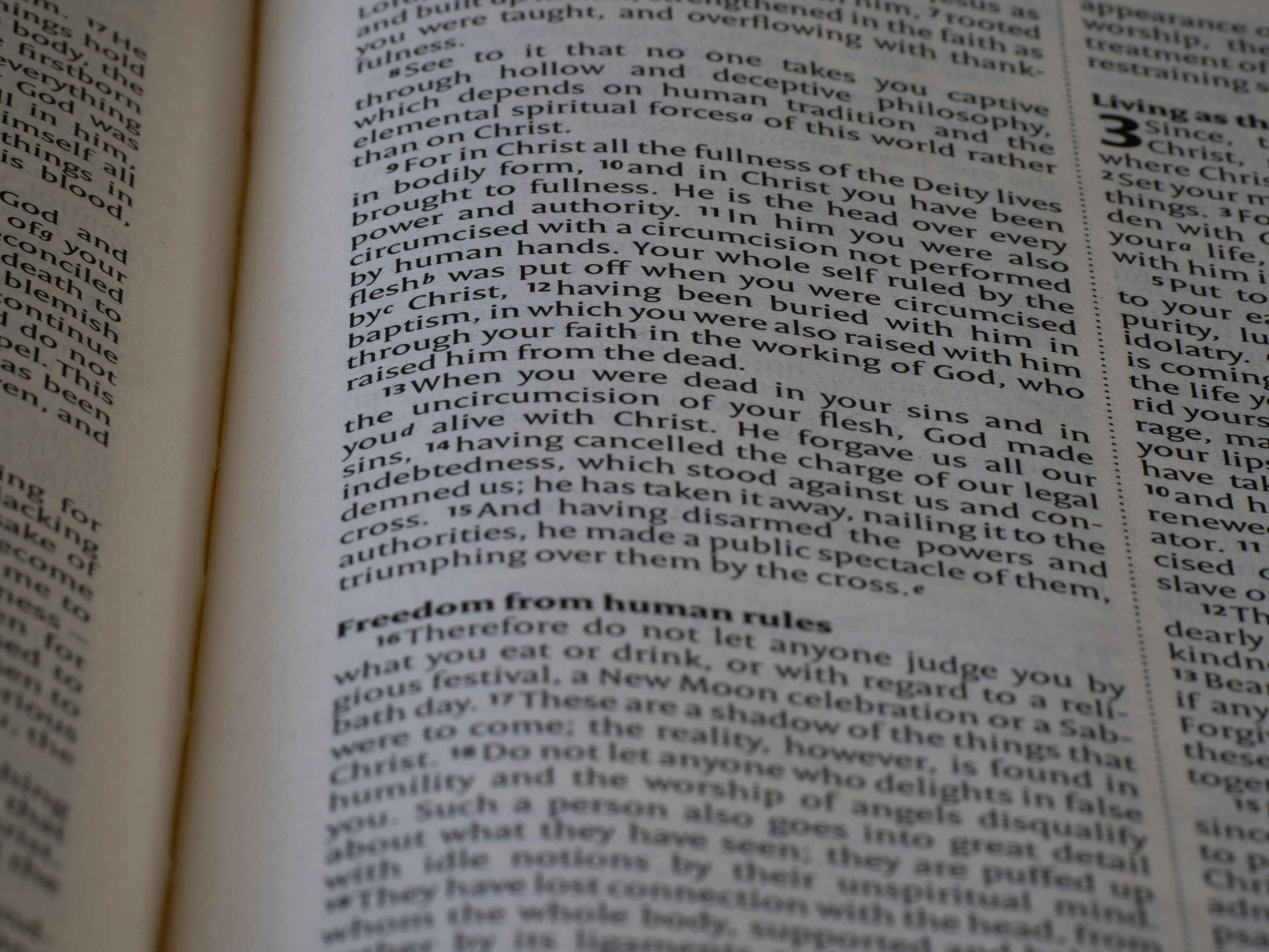 A close-up shot of the Indian Constitution's page open to Article 324, with a magnifying glass highlighting the text, symbolizing the legal and constitutional aspects.