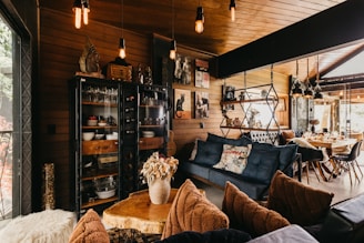 A living room filled with furniture and lots of windows