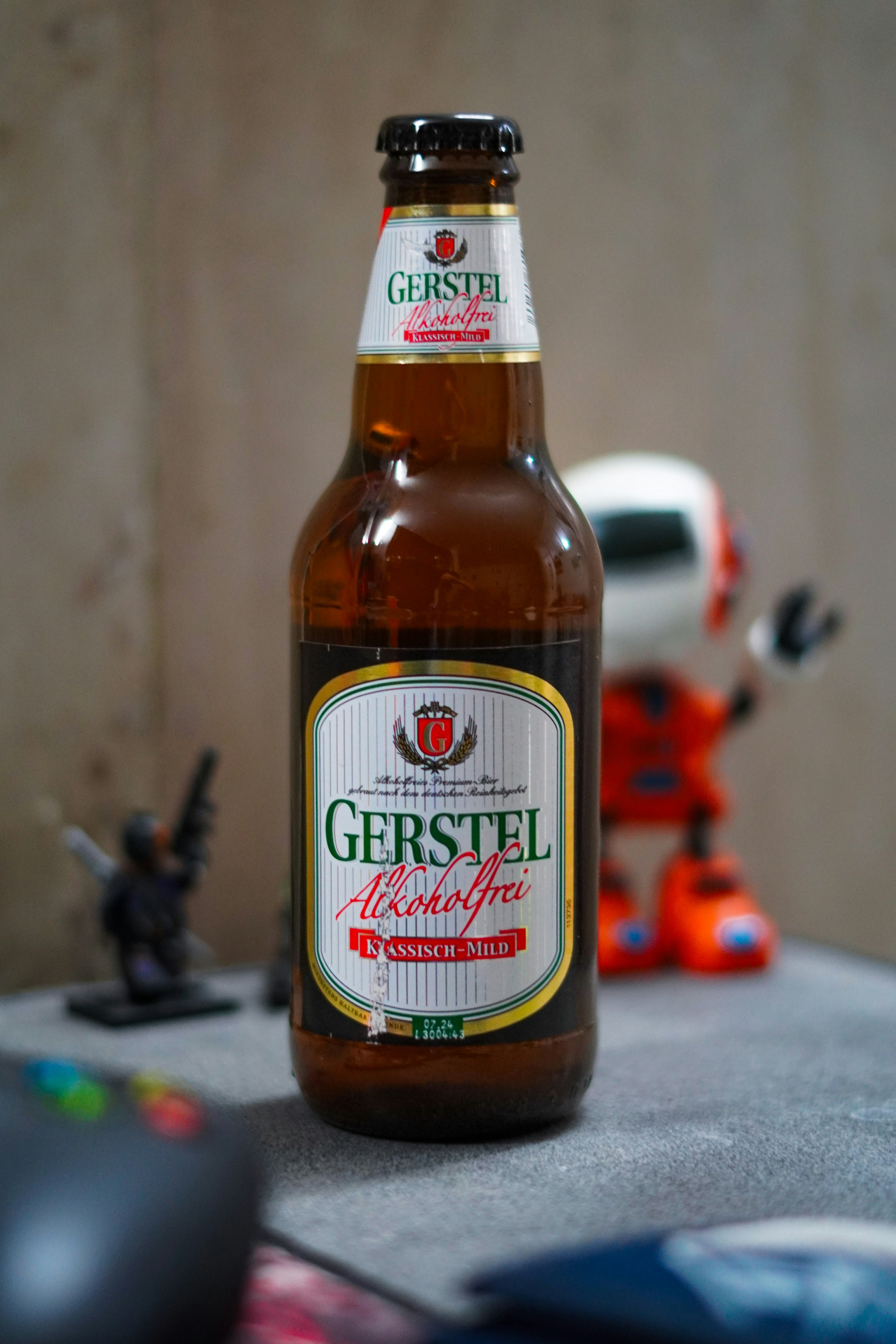 A bottle of beer sitting on top of a table
