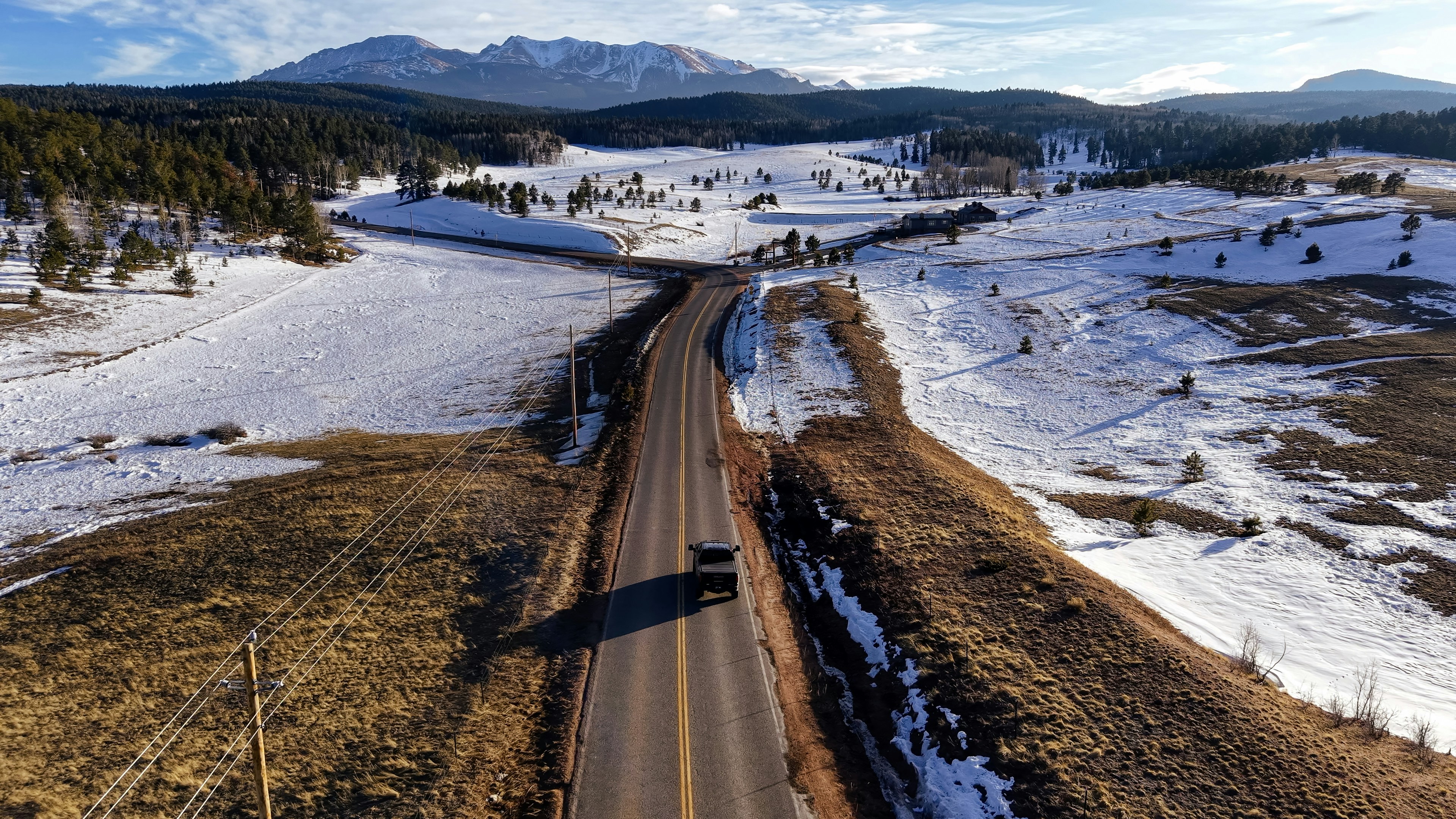 An aerial view of a road in the middle of nowhere