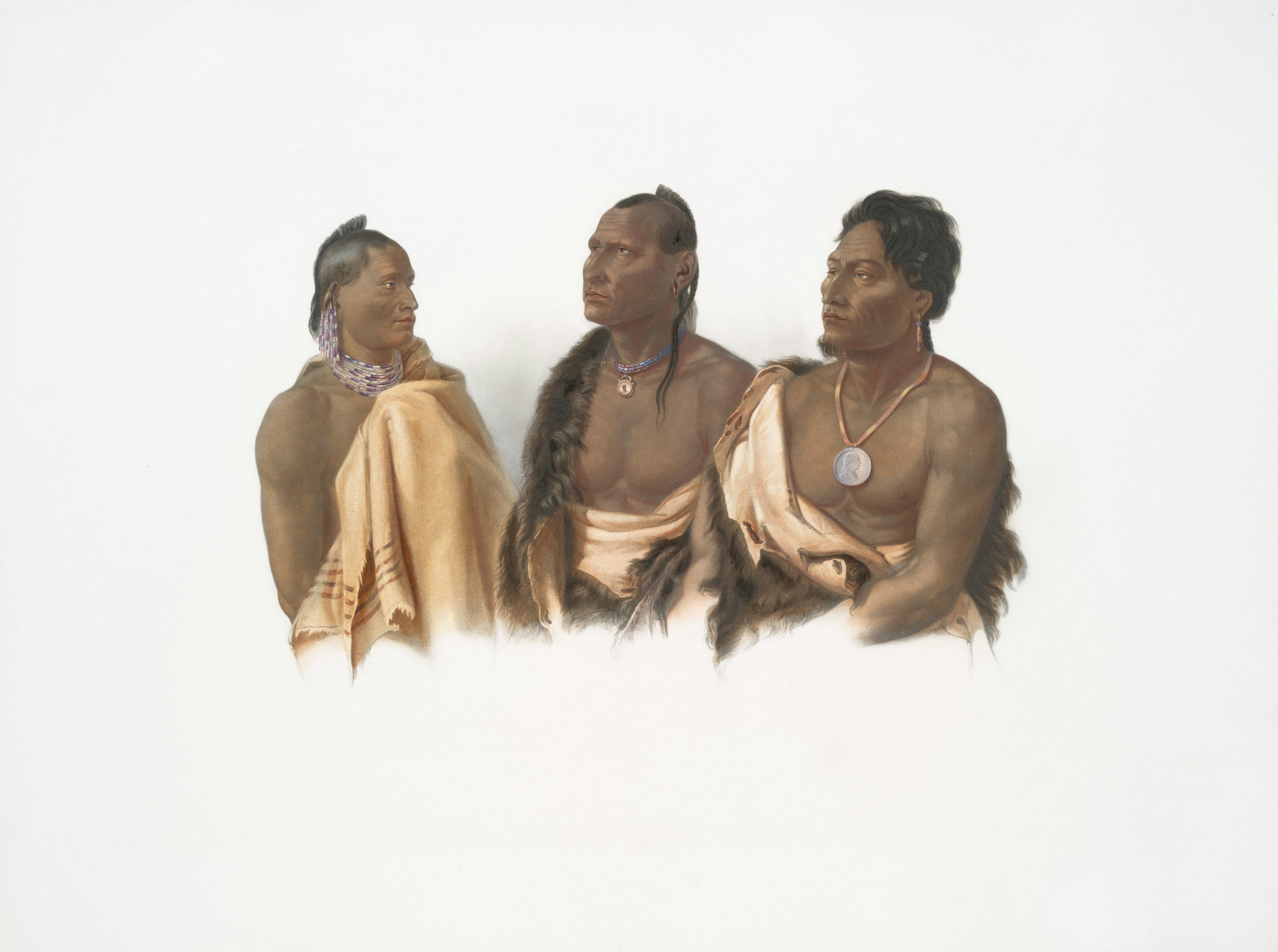 Three native american men in traditional attire
