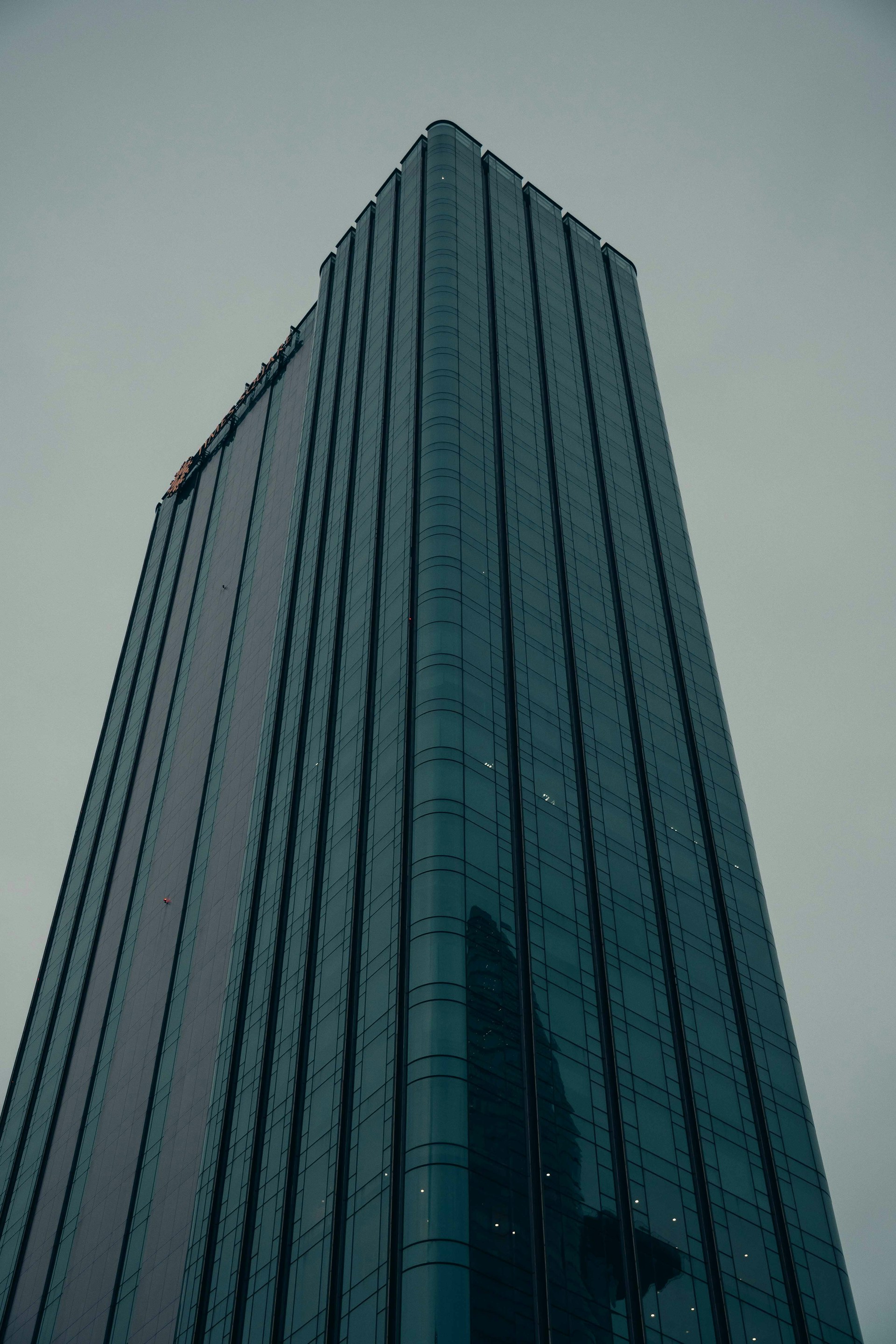 A very tall building with a sky background