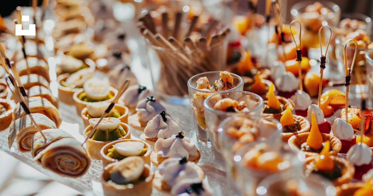 On Top Table A table topped with lots of food on top of a wooden table photo – Free ...