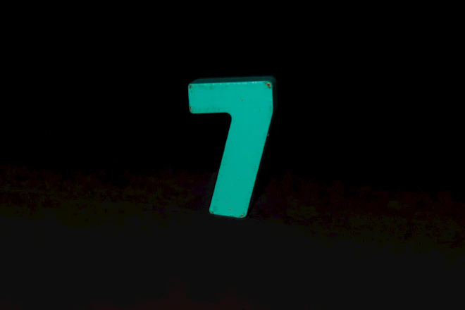 The number seven is lit up in the dark