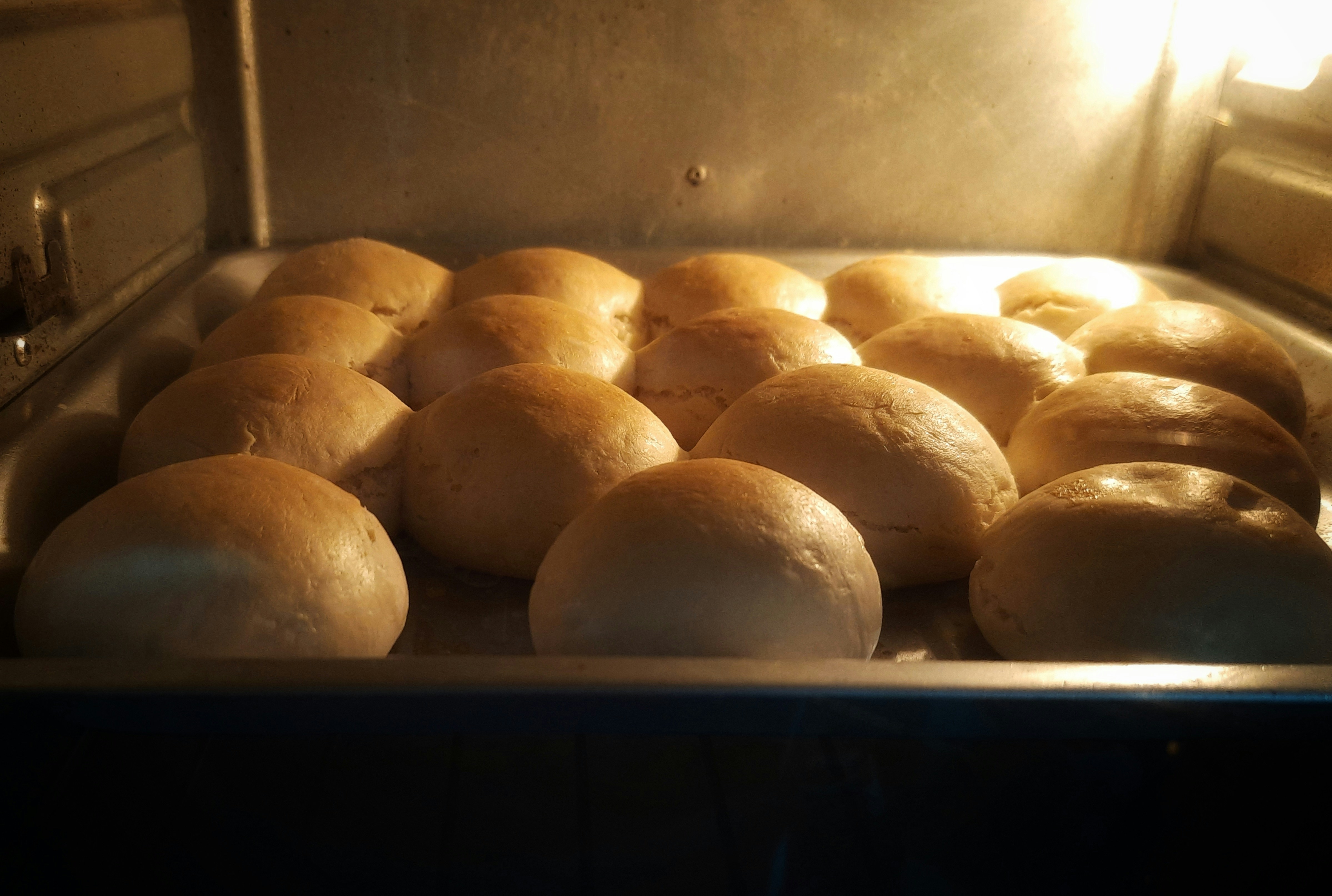 A bunch of donuts in an oven