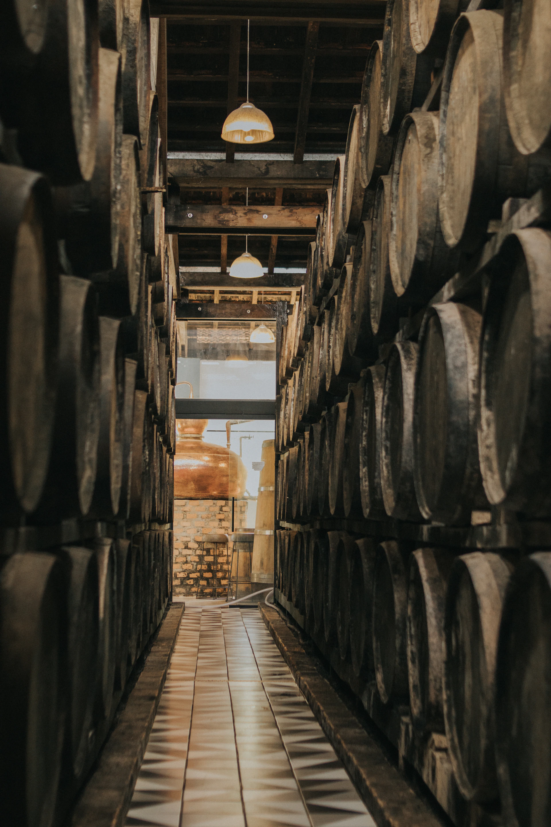 A room filled with lots of wooden barrels