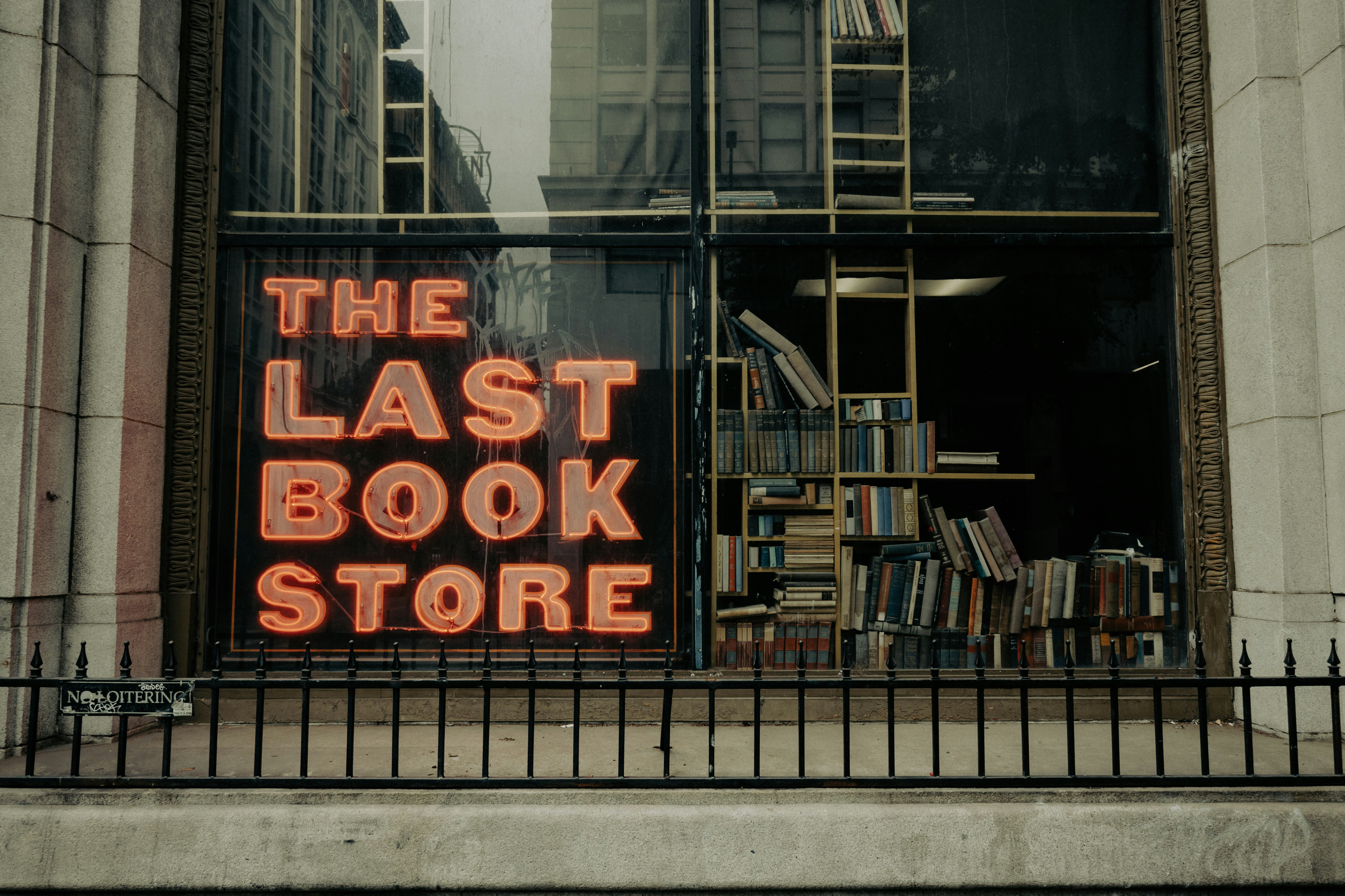 A sign that reads the last book store