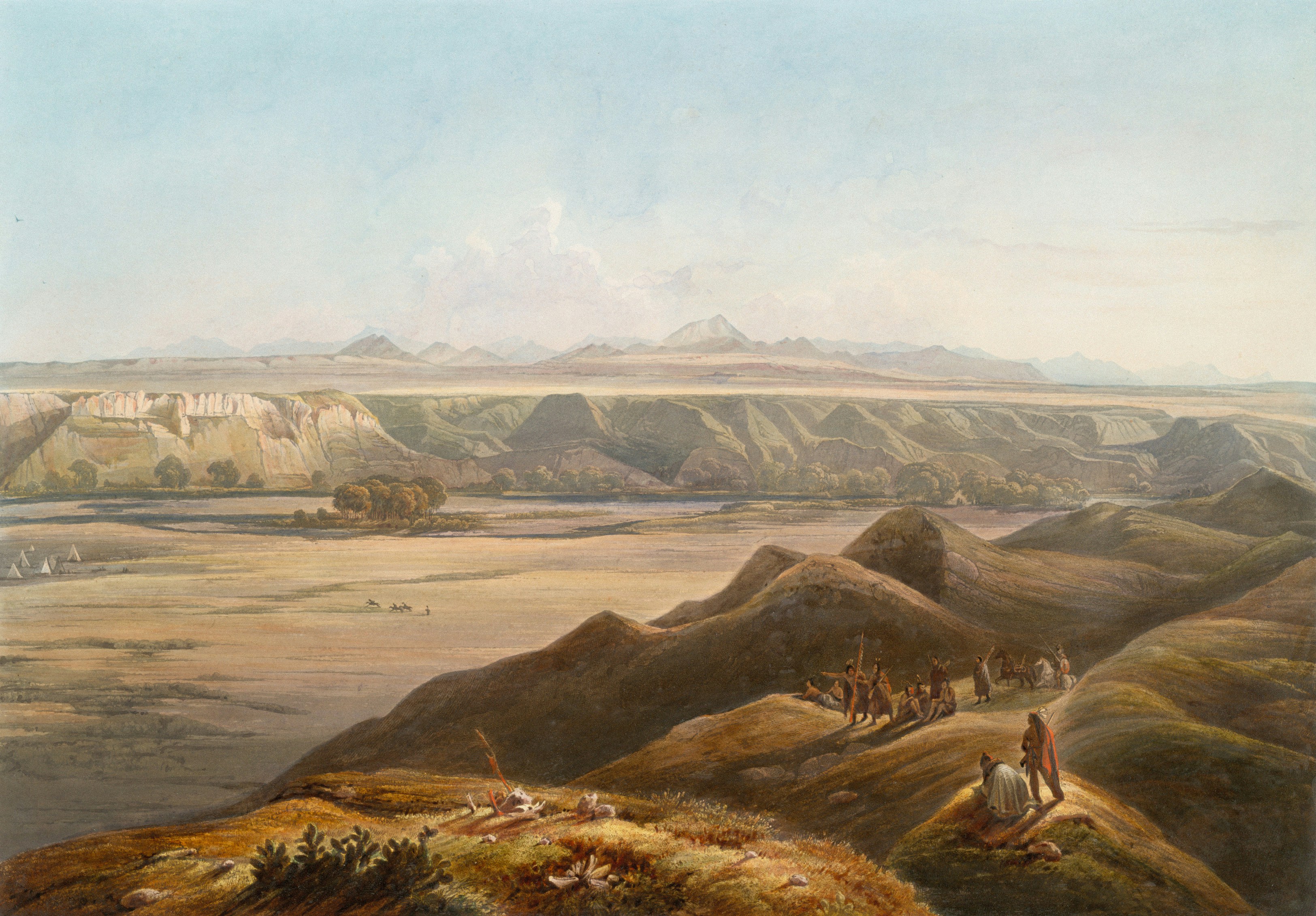 قرية للسكان الأصليين على ضفة نهر مع جبال بعيدة