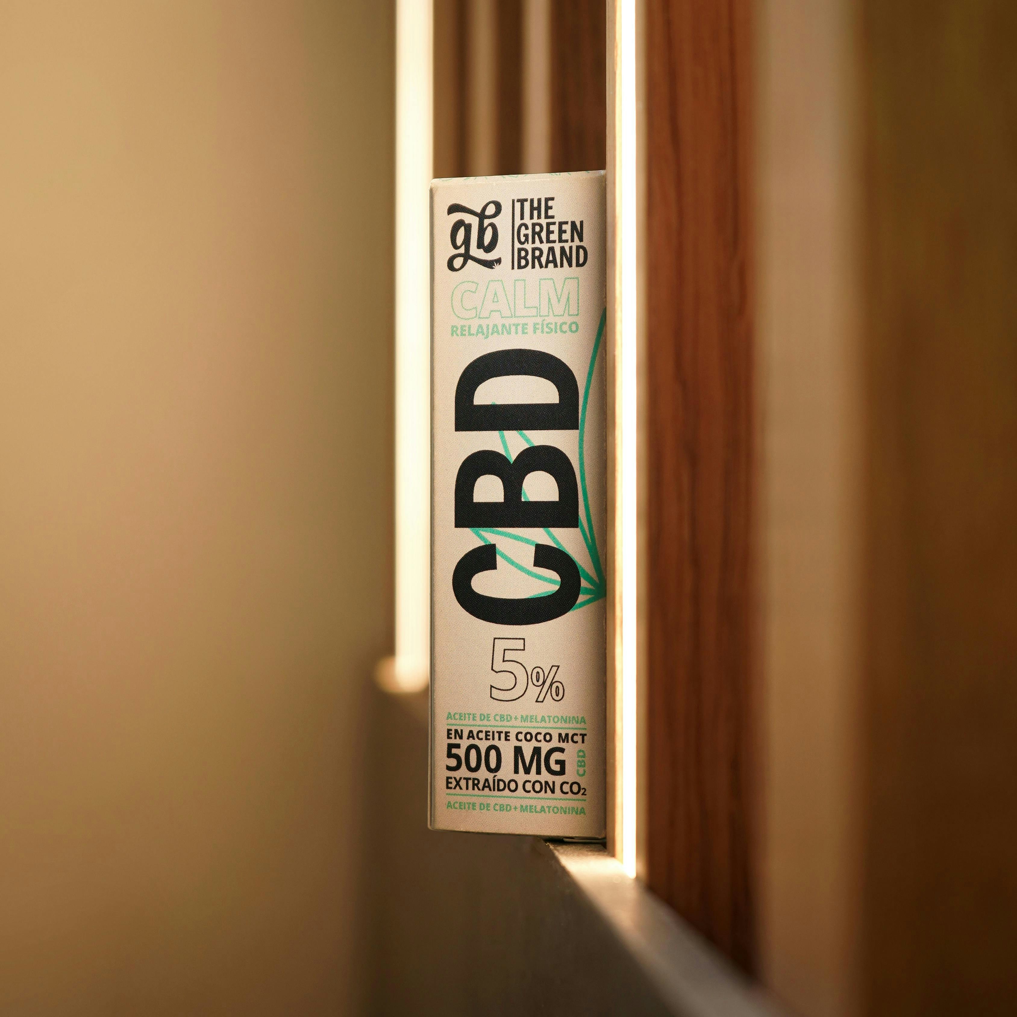 A tube of cbd sitting on top of a door