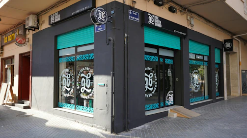 A store front with asian writing on the windows