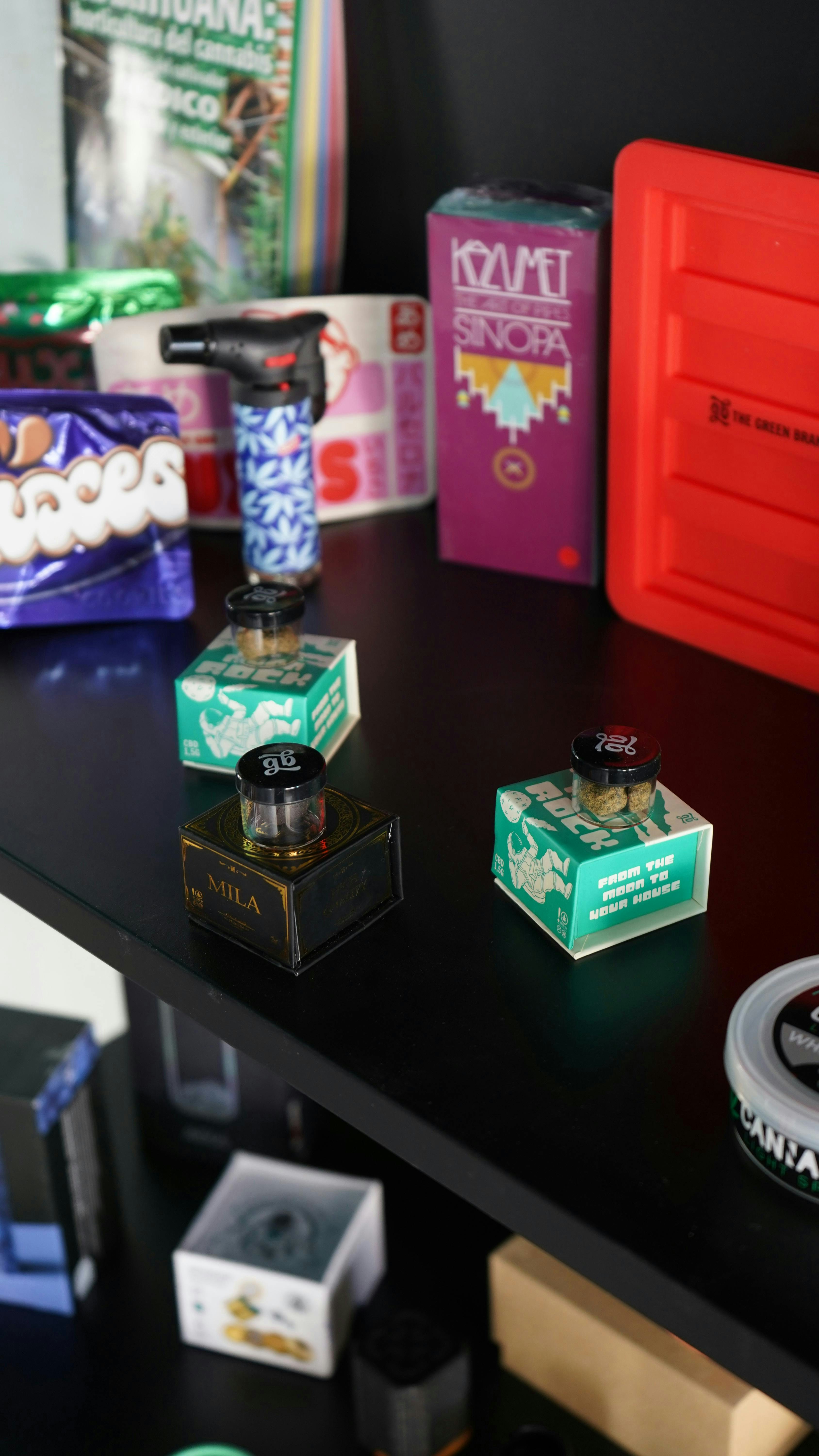 A black table topped with lots of different types of items