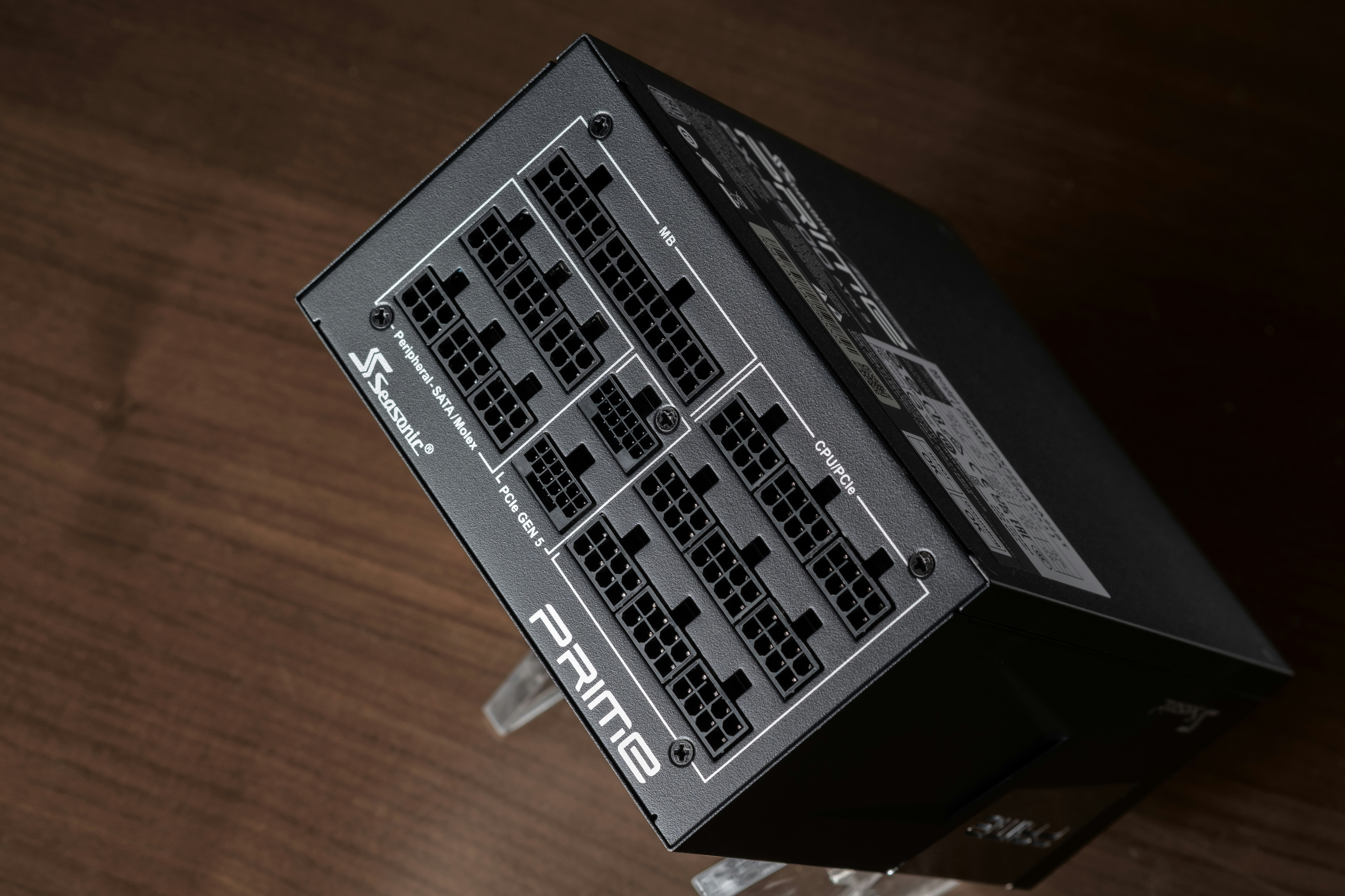 A black box sitting on top of a wooden table