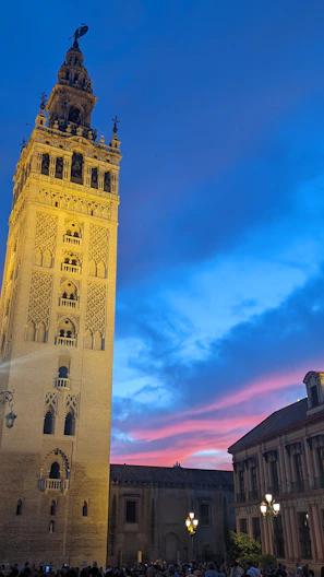 A tall clock tower towering over a city