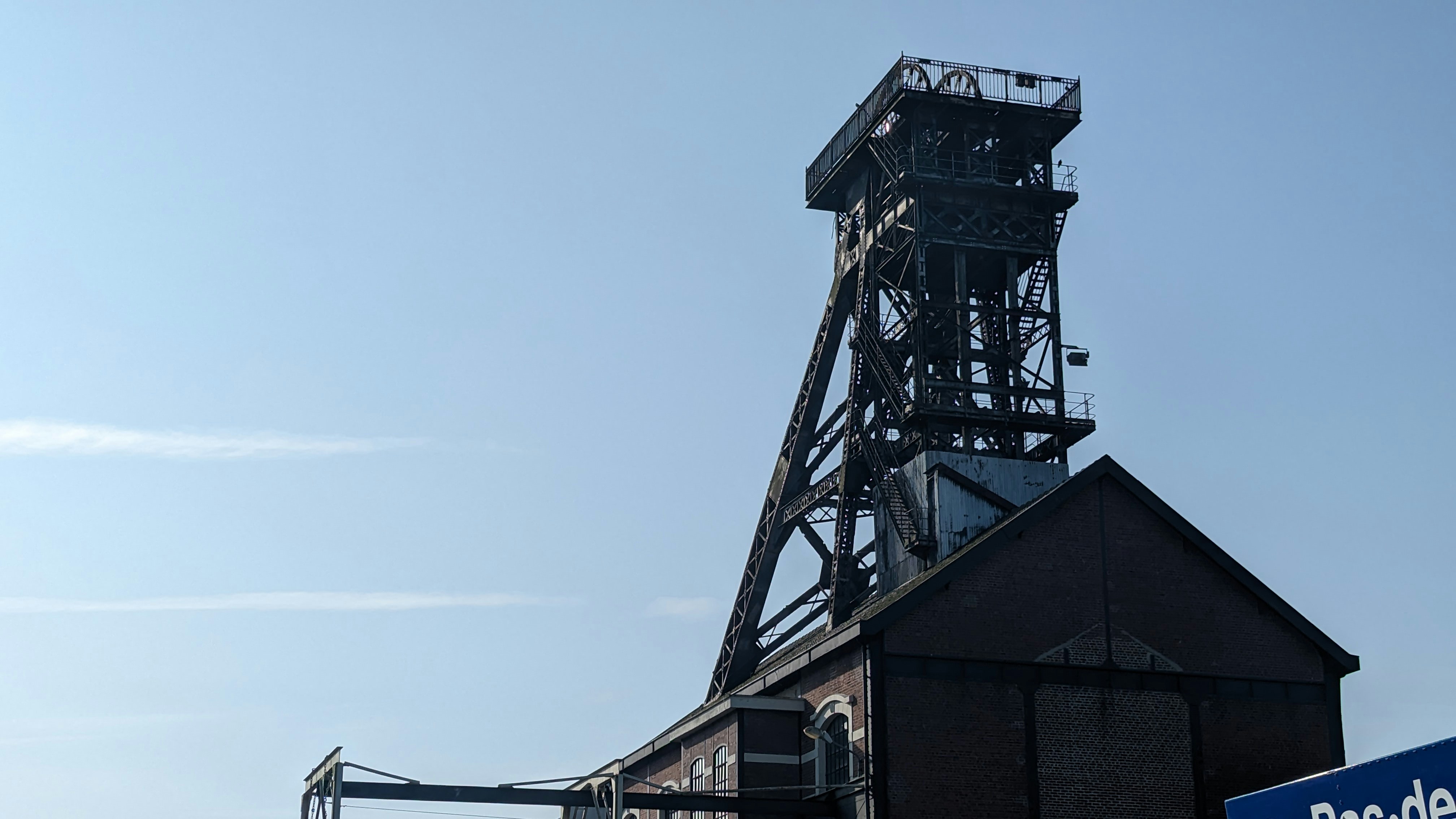 A sign that is in front of a building