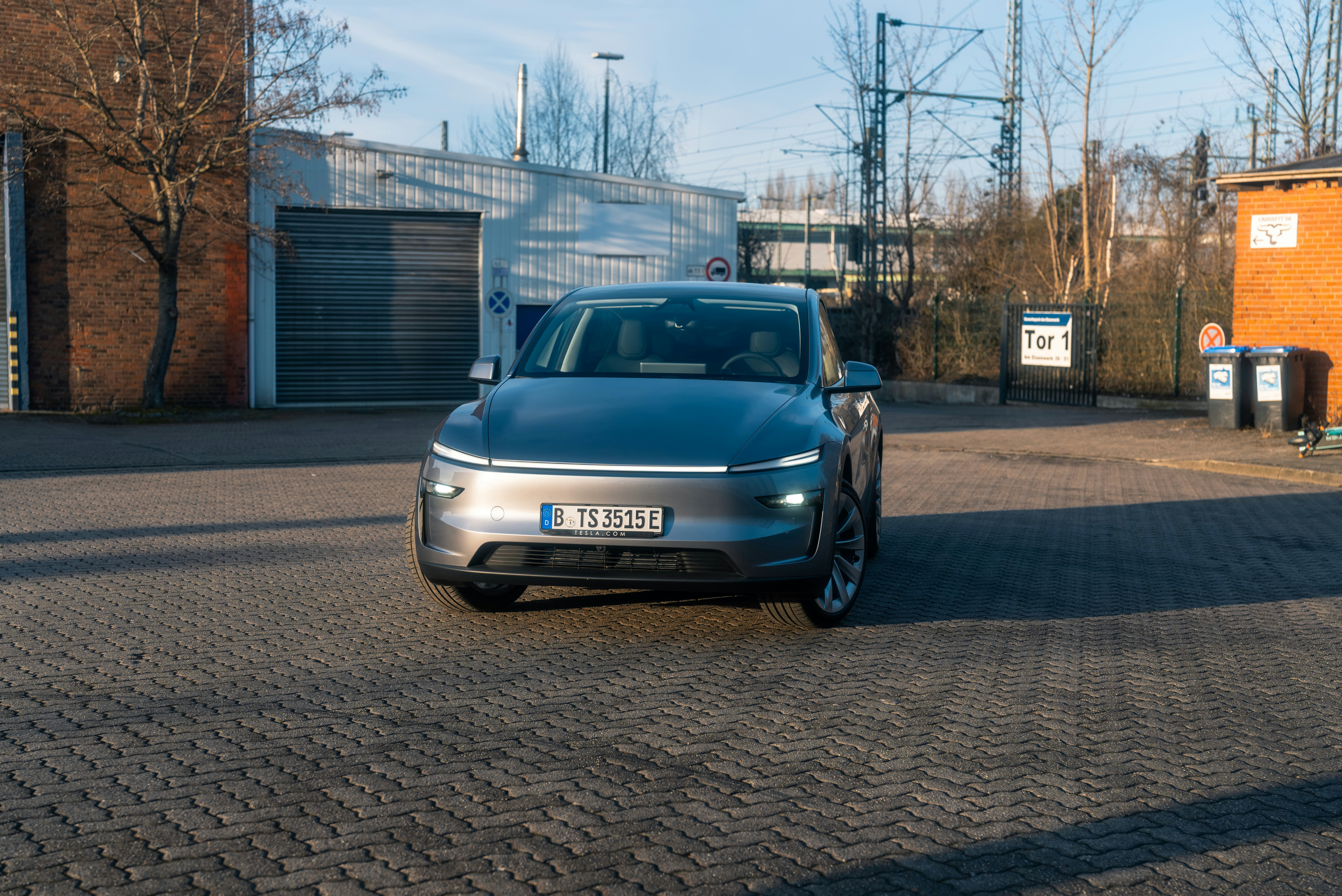 Volkswagen ID.Buzz electric van charging at a public station