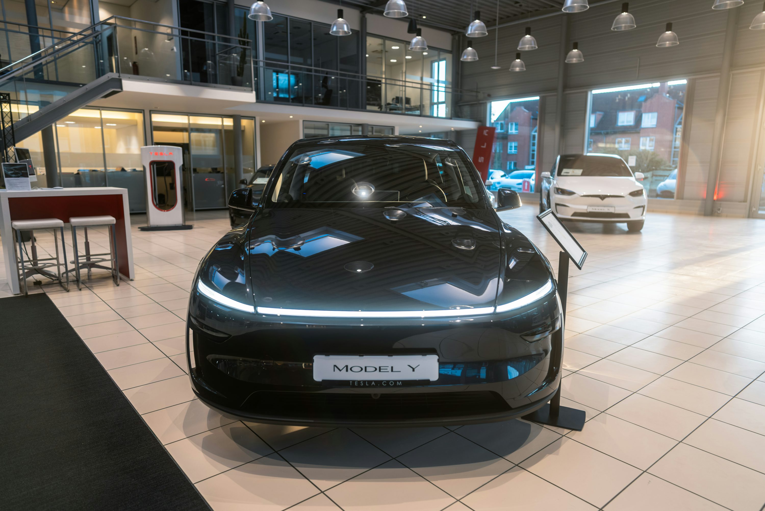 A car is on display in a showroom