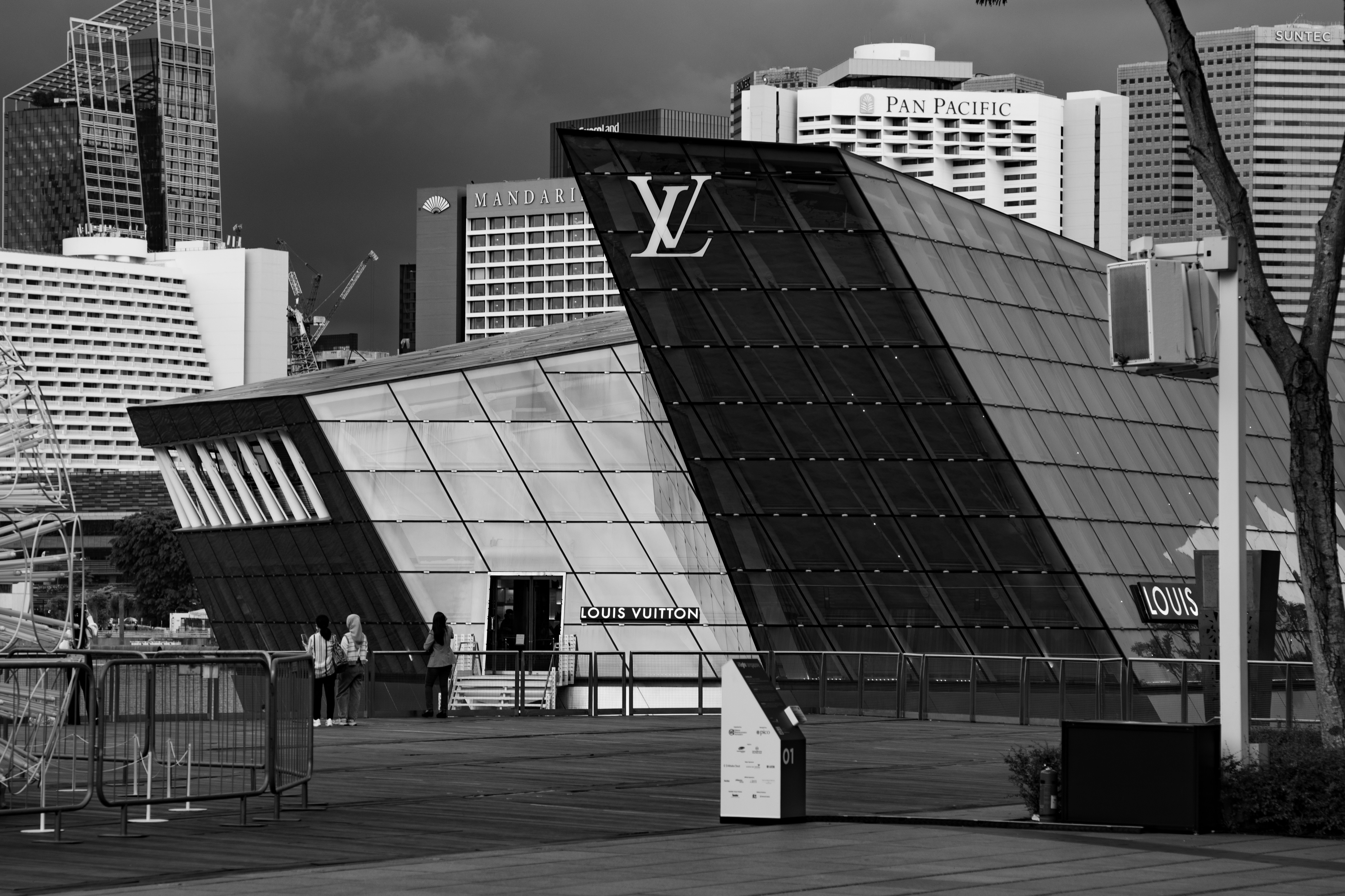 A black and white photo of a large building