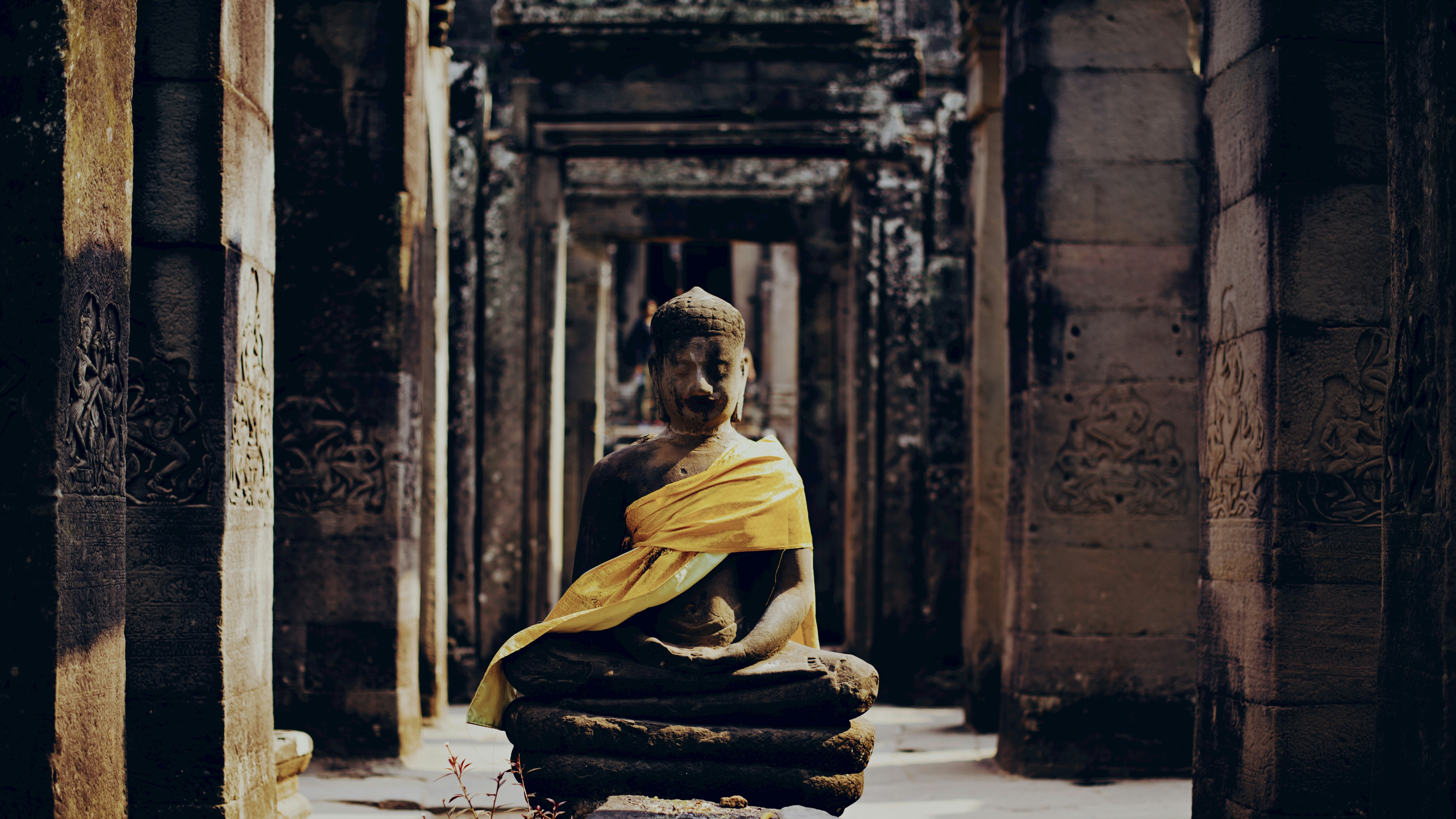 A man sitting on a chair in an old building
