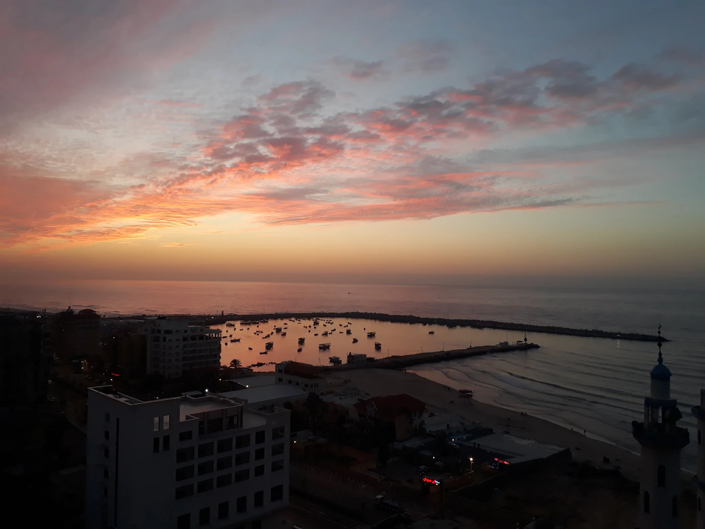 Sunset over the sea at the Gaza port, photographed before the war