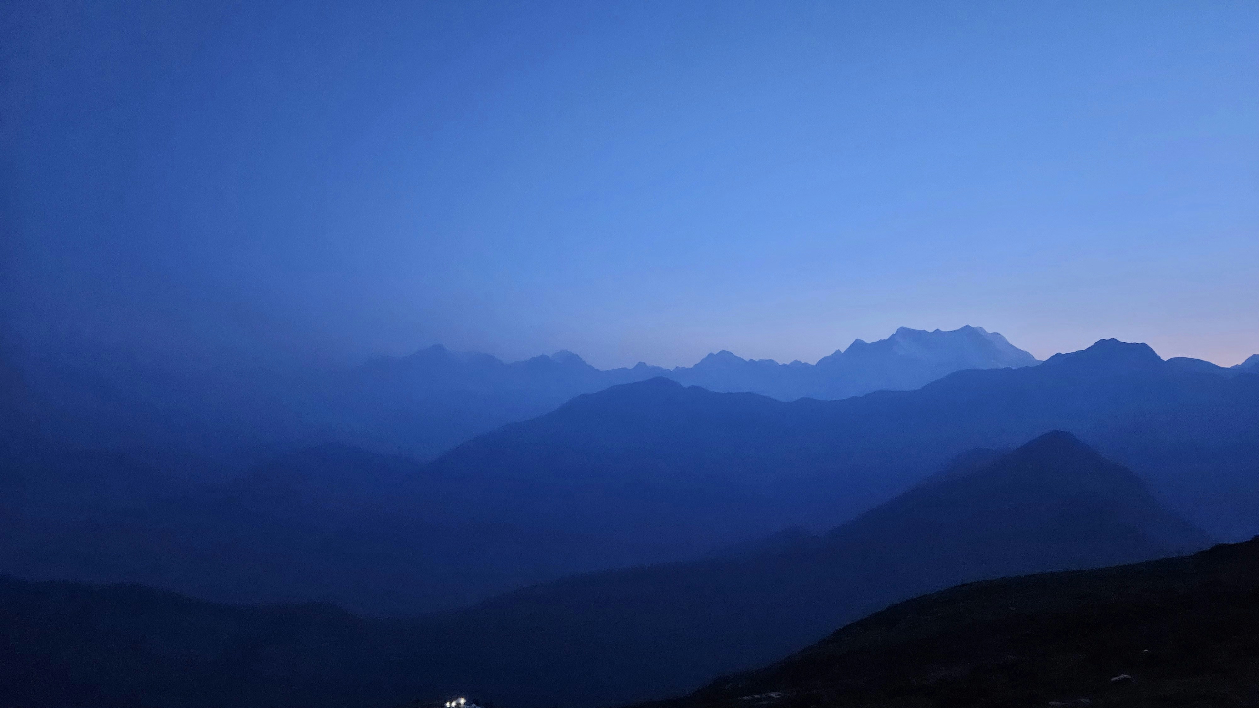 A view of a mountain range at night